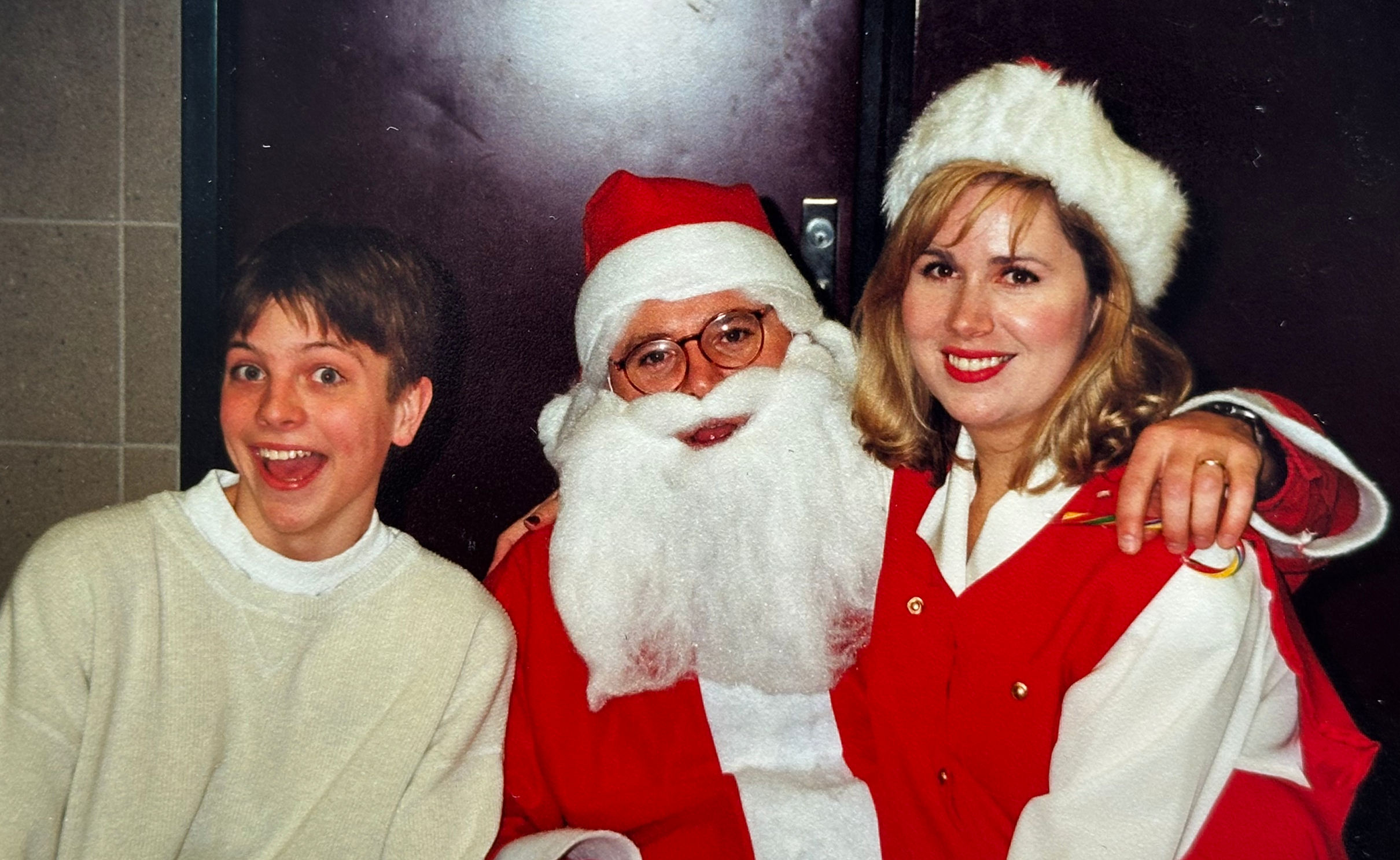 Jacob Reitan is pictured with GSA faculty adviser Tim Walz, dressed as Santa Claus, and his wife Gwen Walz